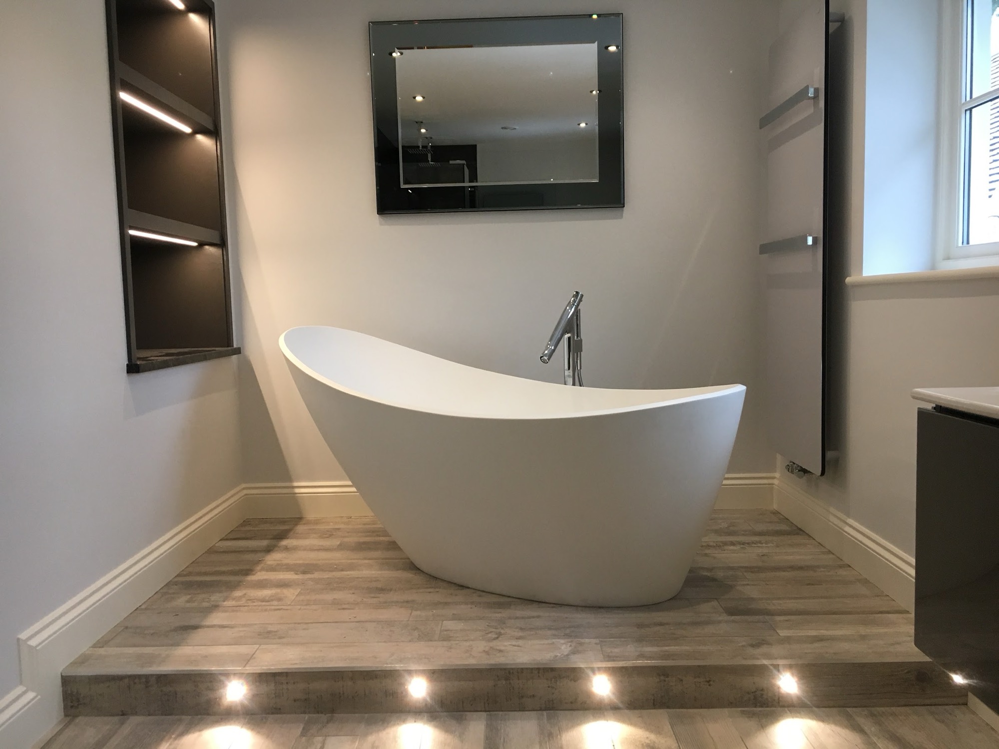 Bathroom lit on three levels — mirror, niche shelves and step lights set into the riser, all installed to suit the bathroom zones.